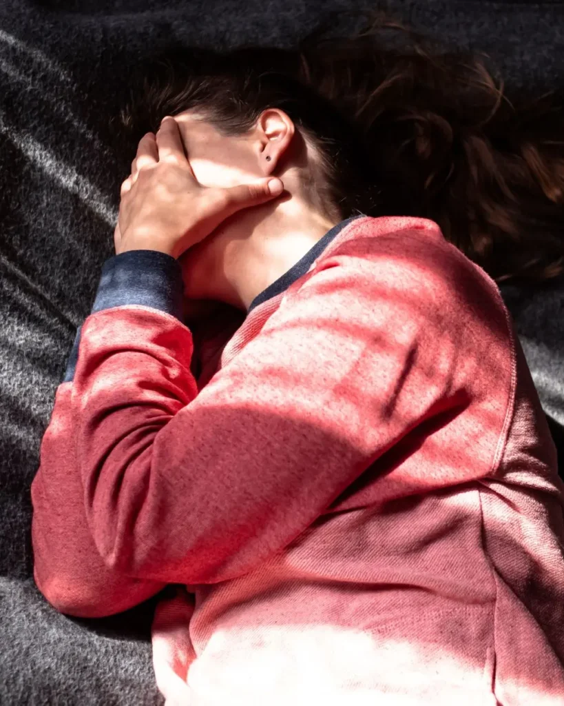 The Grove Recovery | stressed tired millennial woman on bed eyes closed 2025 02 10 01 16 31 utc