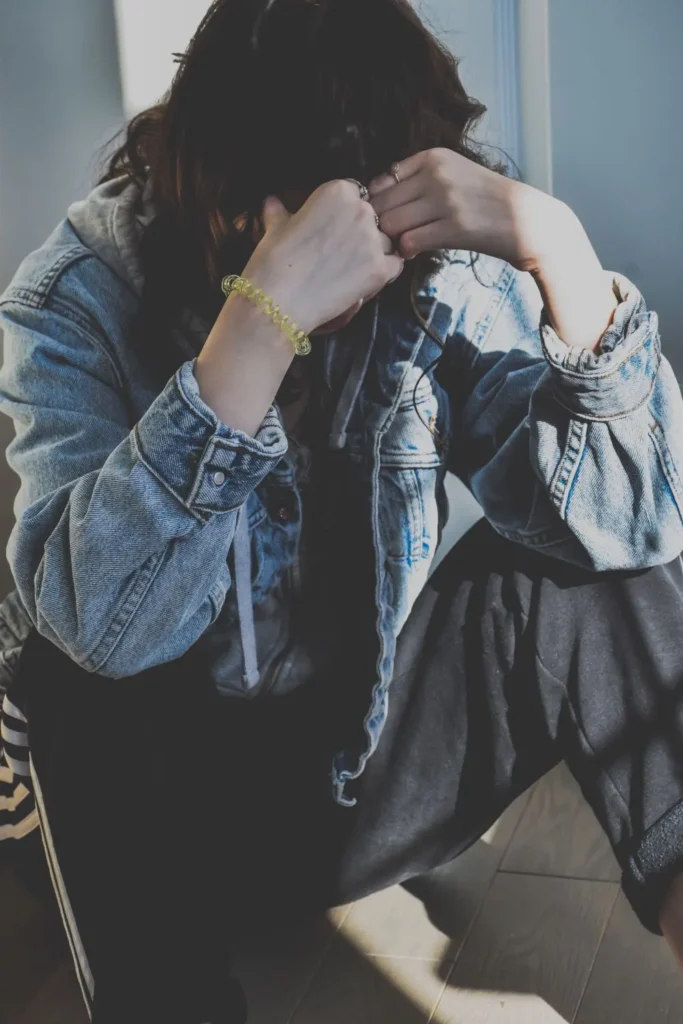 The Grove Recovery | upset teenage girl sitting on a floor covering he 2025 03 12 21 29 40 utc