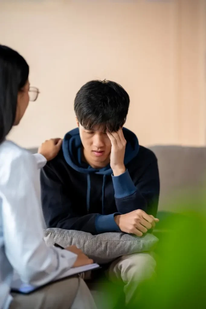 The Grove Recovery | a sad young asian man receives mental health advic 2026 03 27 01 27 48 utc