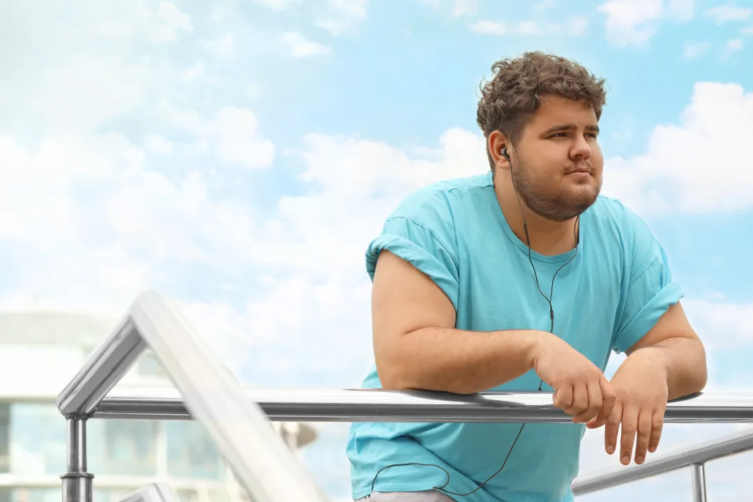 Where can I find affordable, accredited psychotherapy programs for men in Orange County specializing in substance use, eating disorders, and transitional sober living?