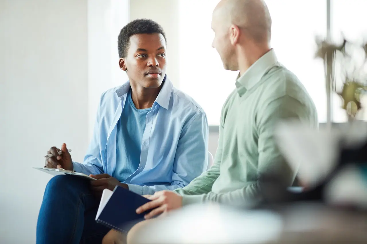 The Grove Recovery | two men discussing business in a workplace 2026 01 08 06 32 16 utc Large